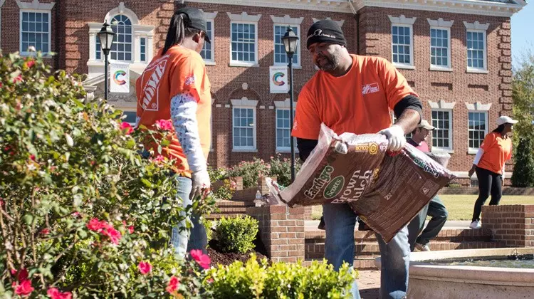 Guy caring fertilizer